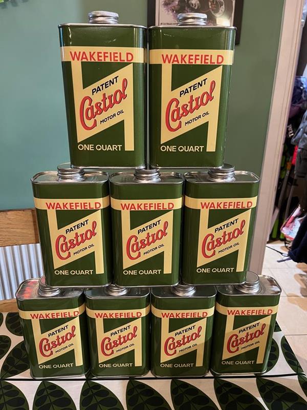 Pyramid of vintage Castrol oil cans