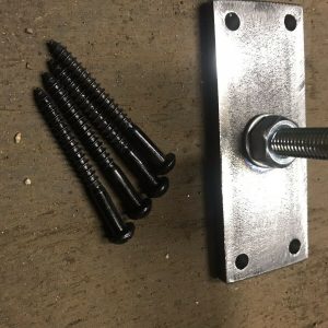 Toilet roll holder upcycled from a spanner title