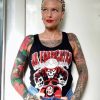 Model wearing a ladies Lambretta series 1 mutant vest in black with JB Fabrication logo