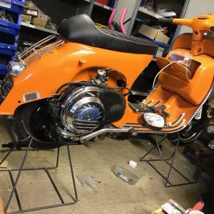 Sturdy display stands for Lambretta or Vespa scooters with 10-inch wheels. title