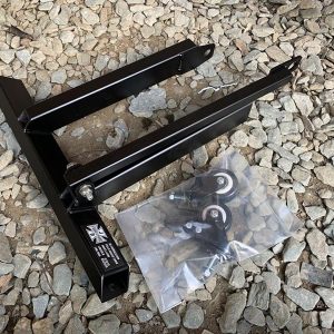 A dolly which fits to a scooter frame via the standard engine mount and the shock mount and allows you to move/store your engineless scooter with ease.  title