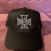 JB Fabrication black trucker cap with the JB Fabrication logo embroidered in white on black.