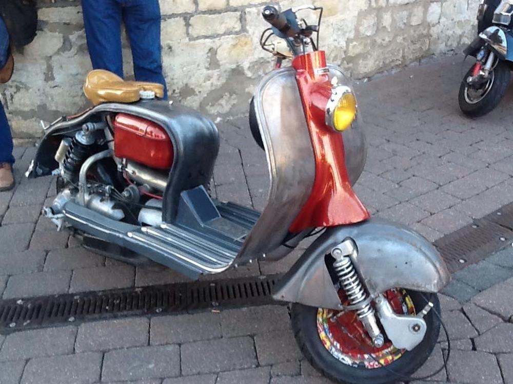 Silver and orange Lambretta LD