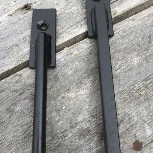 Security window bars painted white and made from 12mm solid round bars with laser cut 30x6mm ends drilled with 6mm holes and countersunk to accept security fixings.