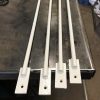 Security window bars painted white and made from 12mm solid round bars with laser cut 30x6mm ends drilled with 6mm holes and countersunk to accept security fixings.