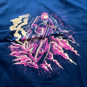 T-shirt with a pink skeleton riding a motorbike on it