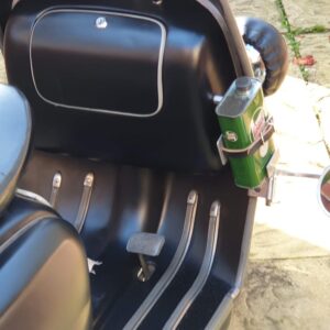 1 Pint castrol oil can in a carrier with a leather strap