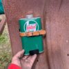 Replica Castrol oil can mounted on a scooter legshield