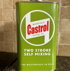 olive green and white Castrol two stroke self mixing motor oil can