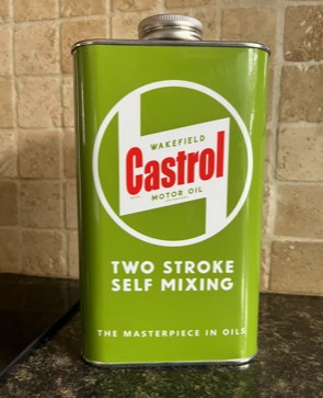 olive green and white Castrol two stroke self mixing motor oil can