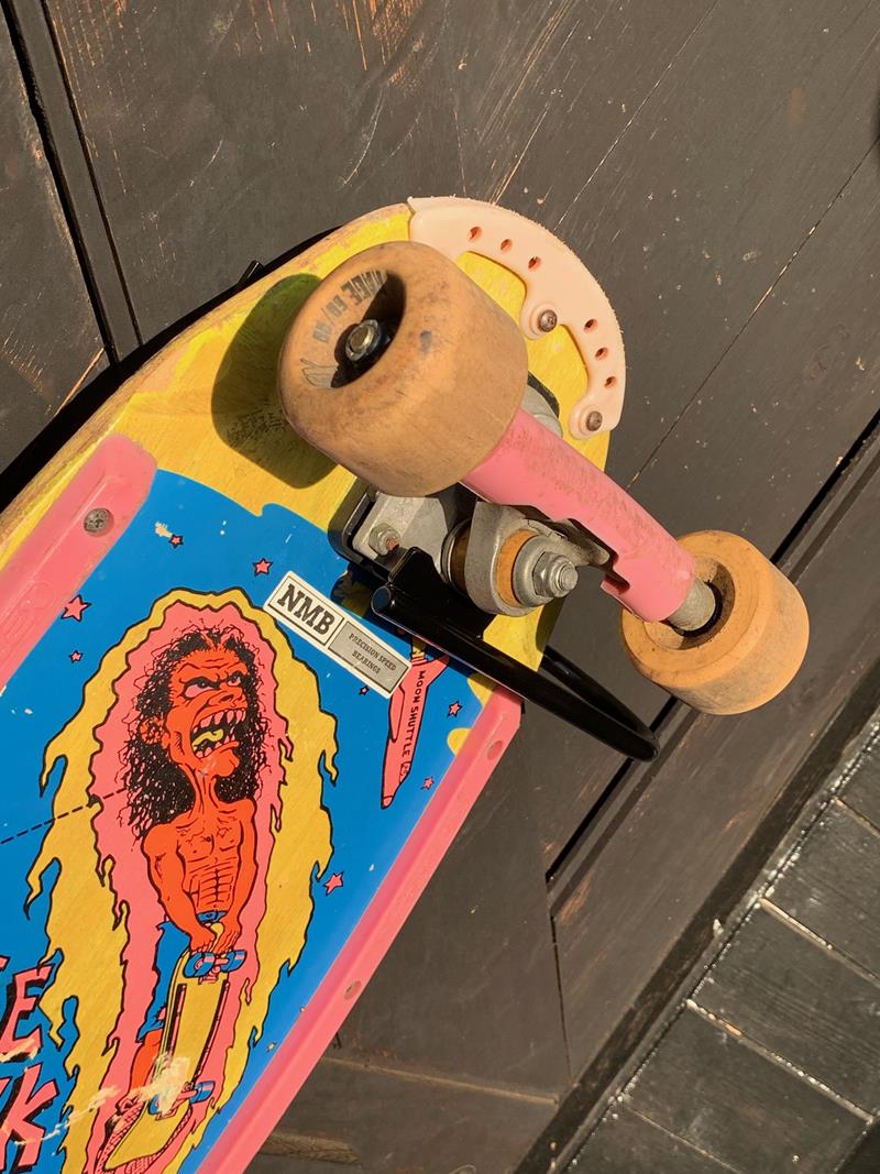 Skateboard on a black hanger