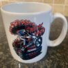 White mug with Eddie Kidd design on a motorbike designed by Ryan Lightfoot