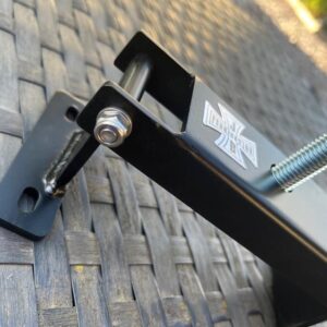 Folding Lambretta clutch compressor tool shown in an open position with bolt screwed through the central mechanism
