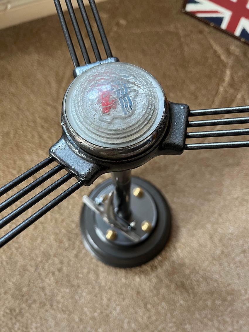 Closeup of Morris minor steering wheel which has been upcycled into a coffee table