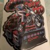 Sticker design featuring a graphic of eddie kidd jumping over vehicles on his stunt motorbike
