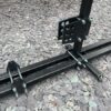 A black powder coated motorbike frame building jig
