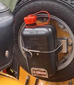 Small petrol can fixed to a spare wheel on a Lambretta scooter