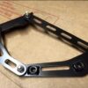 Black powder-coated bonnet hinges for a Ford Escort Mk 1 and 2