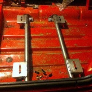 Classic Mini Bolt-in seat bar kit shown in a red car