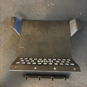 A classic mini sump guard on a piece of wood, showing with fixings.